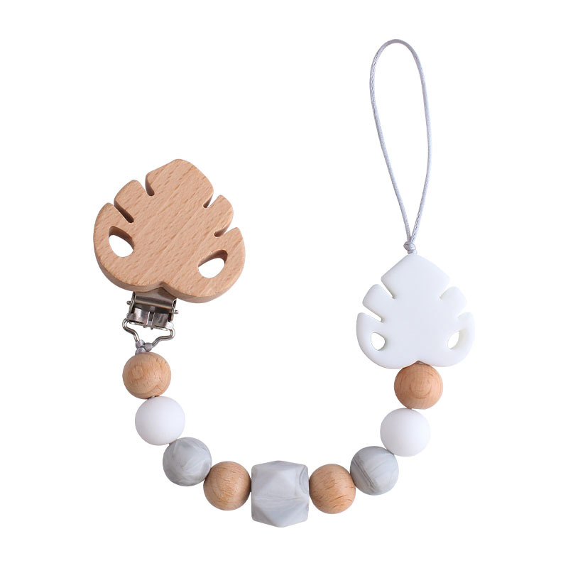Suministros para bebés creativo clip de chupete de hoja de haya juguete mordedor bebé Cadena de chupete de hoja de silicona cadena anti-caída