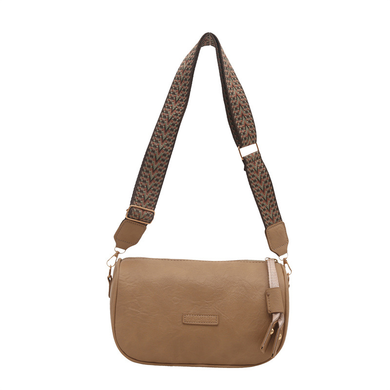 2024 otoño y invierno nuevo bolso de hombro de banda ancha de mujer bolso de mochila casual retro puerto de aire exterior bolso bajo la axila