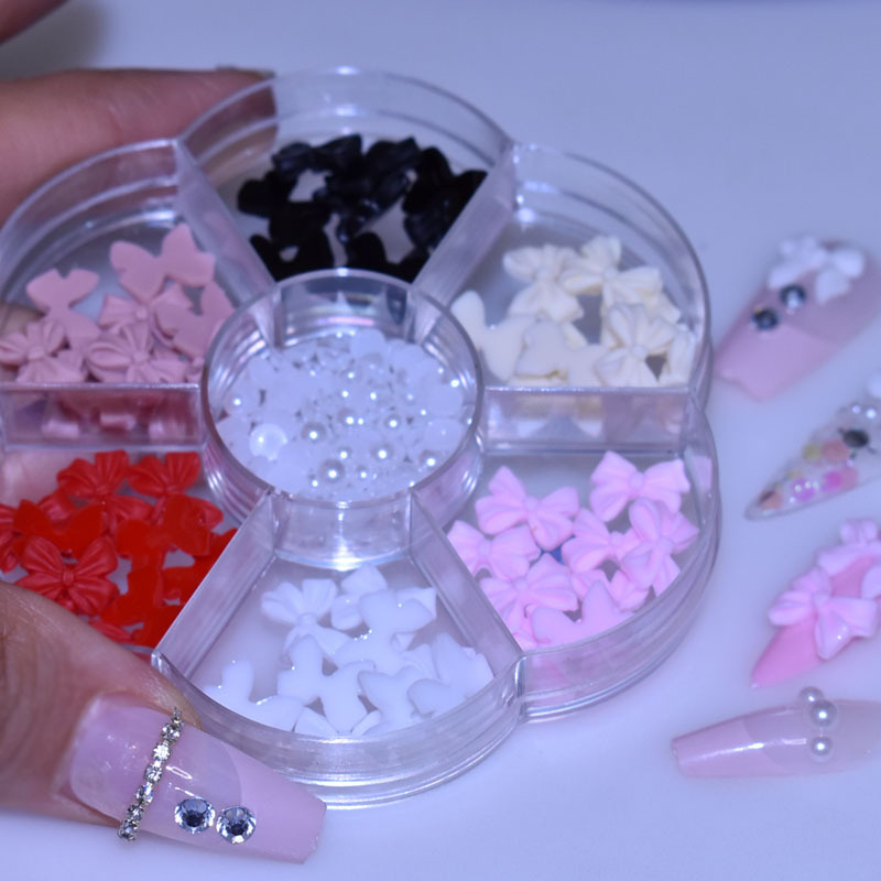 Venta caliente transfronteriza cinta de arco de uñas perla diamante Aurora oso 7 rejilla tocadiscos joyería de uñas al por mayor