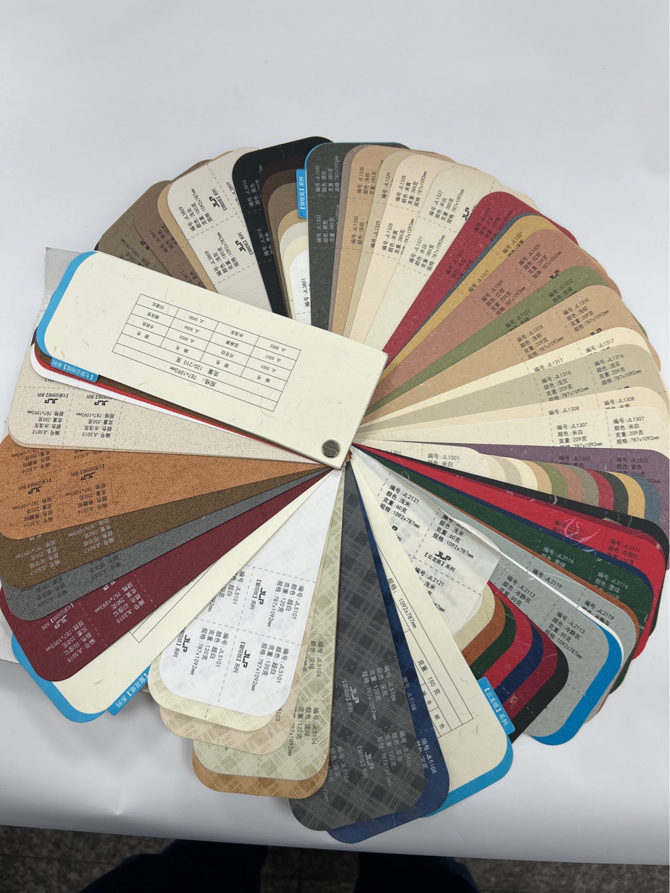 批发120克云龙纸草香纸大地纸特种纸花纹纸茶叶盒礼品袋吊牌包装