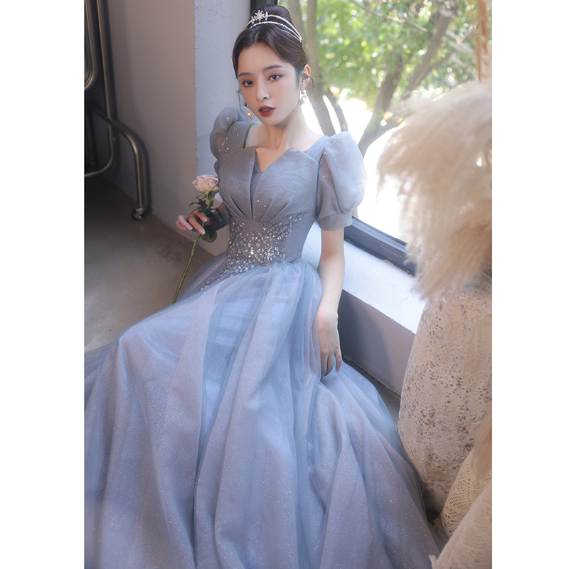 Vestido de noche azul para mujer, nuevo modelo 2026, diseño de calidad para banquetes, actuaciones vocales, exámenes, presentaciones y reuniones anuales, con cuello en V profundo.