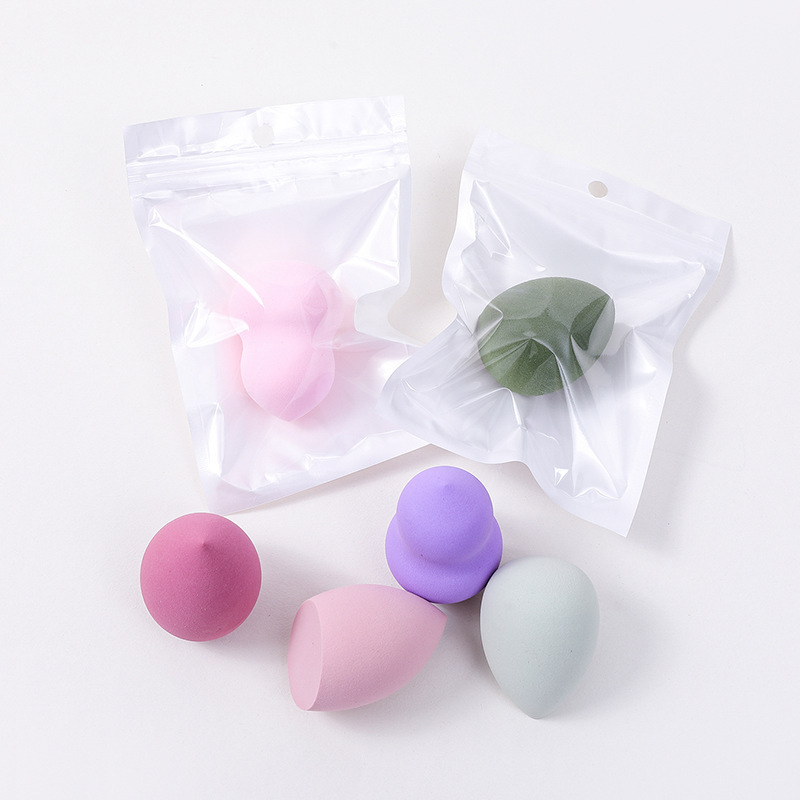 Huevo de maquillaje transfronterizo envasado independiente polvo de cojín de aire para secar y húmedo de calabaza de doble propósito goteo de maquillaje esponja de maquillaje huevo de maquillaje de color