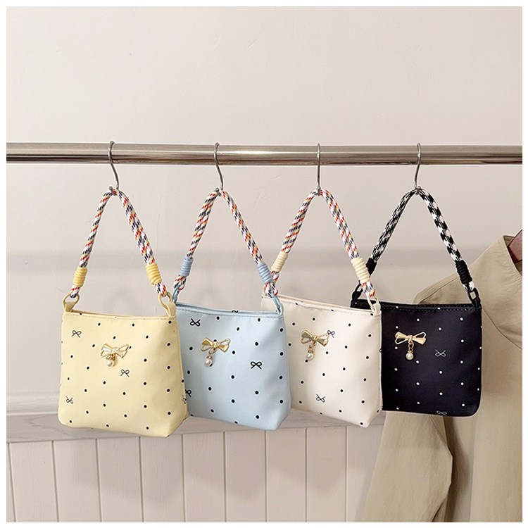Large-capacity cross-border foreign trade fresh-style bucket bag with fashionable print, Korean version, with round rope and pearl pendant, hand-held fabric bag