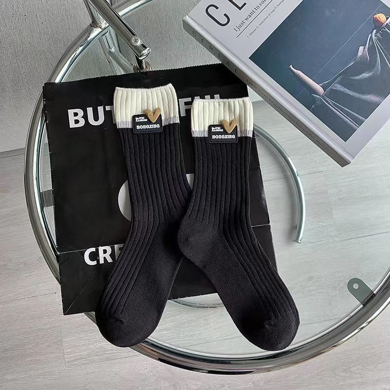 Calcetines de algodón de color puro calcetines de mujer de otoño e invierno a media pantorrilla calcetines de dopamina desgaste ins moda doble aguja amor Rosa pila Calcetines