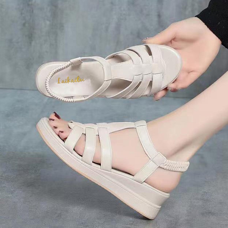 2026 verano nuevo cuero suave anti-derrapante sandalias romanas retro moda elástica zapatos de madre de talón de pendiente