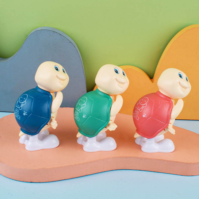 Clockwork saltando juguete cadena Jumping tortuga nostálgico de los niños pequeño juguete dibujos animados Pequeño animal puesto al por mayor