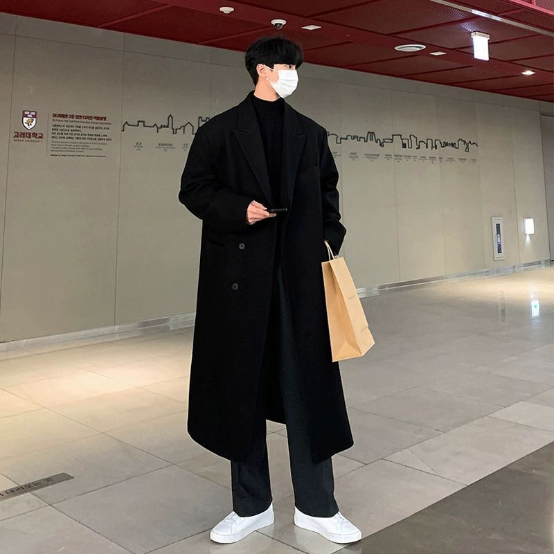 冬の新型の毛はコートの男性の中で長いタイプはひざを過ぎてカシミヤのラシャの風衣の男性のコートの韓国版がゆったりとしています。