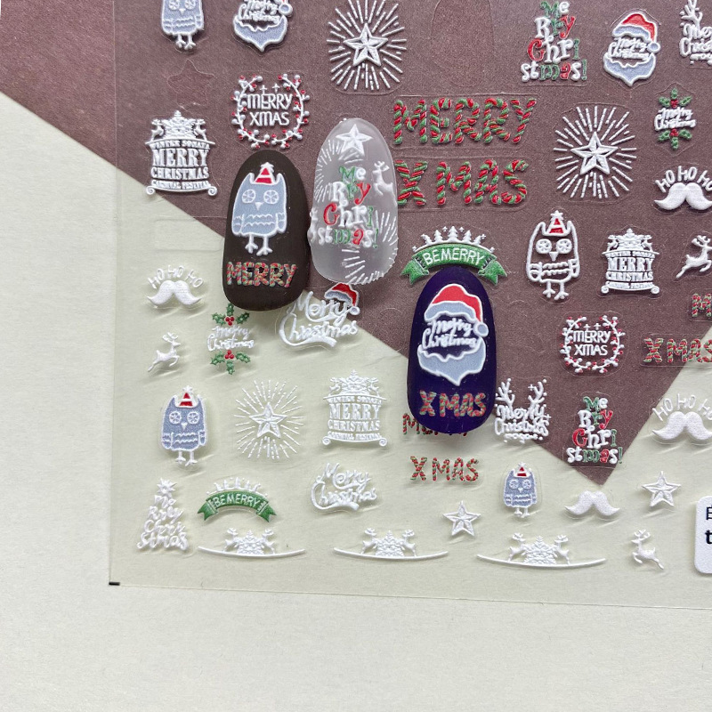 Pegatinas de uñas decorativo pequeño patrón Navidad Santa Claus Otoño e Invierno alivio de dibujos animados copo de nieve tridimensional Internet celebridad pegatinas de uñas