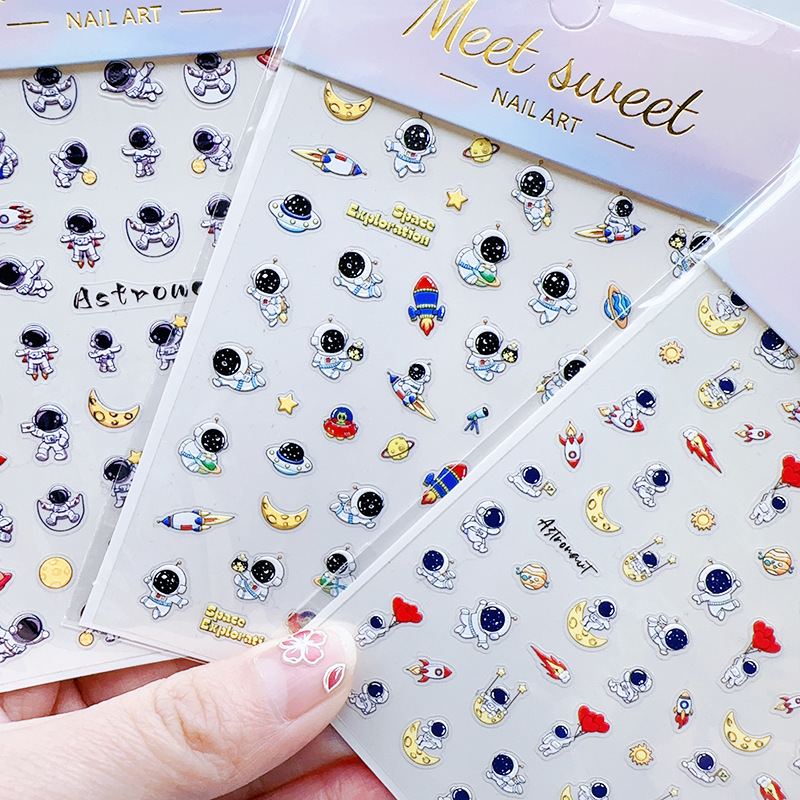 5D relief three-dimensional nail stickers space travel notes rocket astronaut planet can be applied to the face nail decal 5D relief three-dimensional nail stickers space travel notes rocket astronaut planet can be applied to the face nail decal