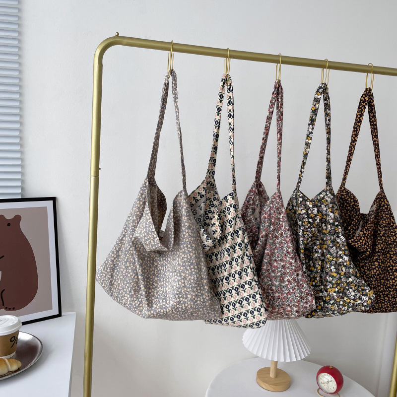 Diseño nicho bolsas de lona para mujeres 2025 nueva gran capacidad coreana estampado de leopardo flor de hombro impresa bolsas de mujer