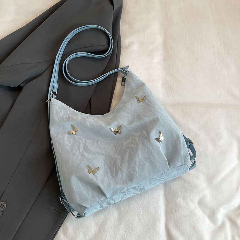 Tote Bag de mujer 2024 nueva mochila casual sensación de alto nivel multifuncional mochila de viaje ligera de hombro