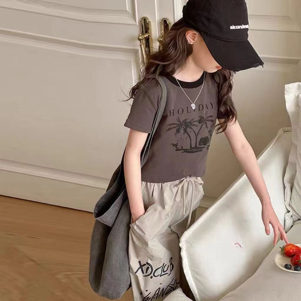 Traje de verano para niñas 2025 nuevo estilo ropa de verano occidental de moda para niños grandes camiseta de manga corta pantalones casuales de dos piezas