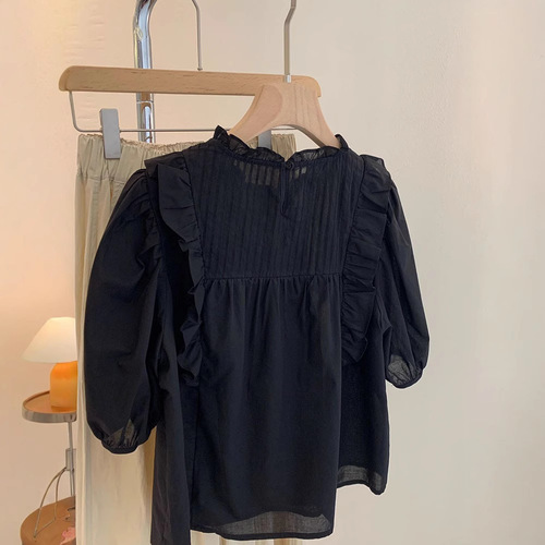 Black shirt with loose pleated ruffles, doll-style top—summer new arrival, forest-inspired solid color, sweet short-sleeved, niche design that won’t clash with others.