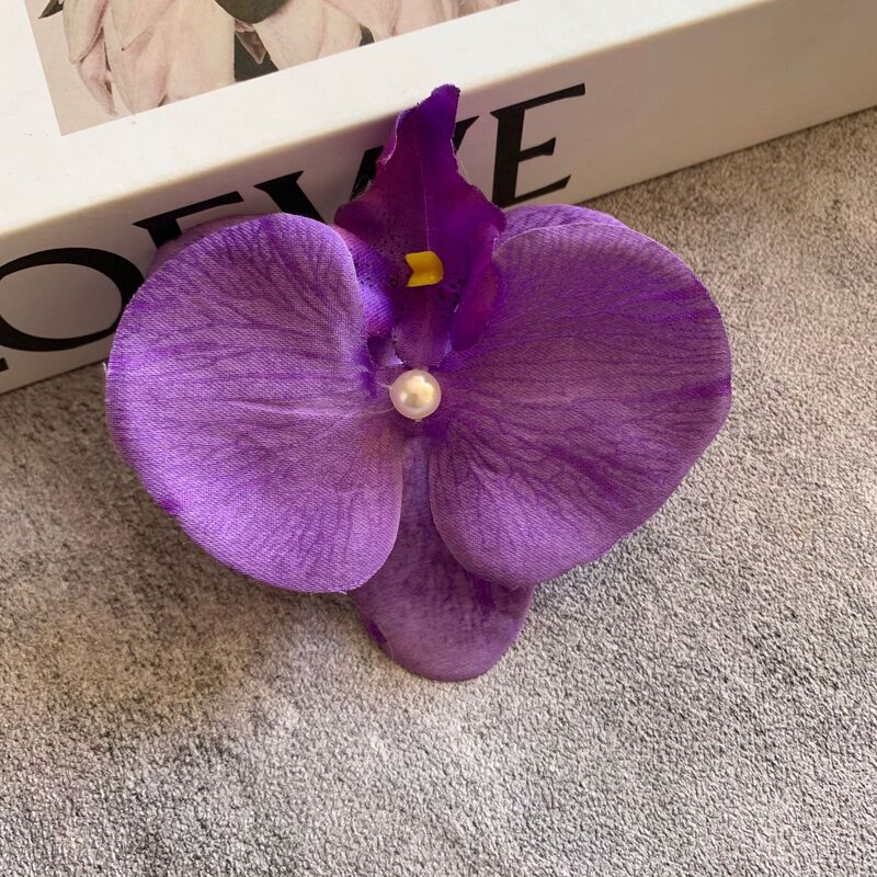 絹布の胡蝶蘭の花の頭は花の壁の部品の花の材料の頭をシミュレーションして髪を飾ってdiyの手作りの結婚祝いの贈り物を挟んで造花を飾ります。|undefined