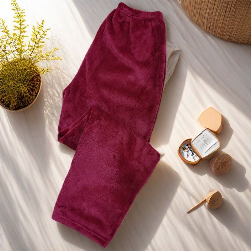 2025 otoño y invierno de franela gruesa pijamas de color sólido para hombres y mujeres de tamaño caliente se pueden usar pantalones de mediana edad y pantalones caseros