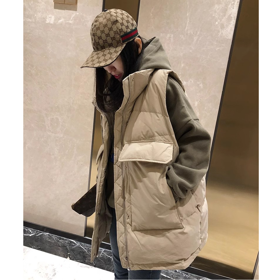 2023 otoño e invierno nuevo estilo coreano más tamaño medio-largo abajo Chaleco de algodón Chaleco de las mujeres chaleco suelto todo fósforo abrigo moda