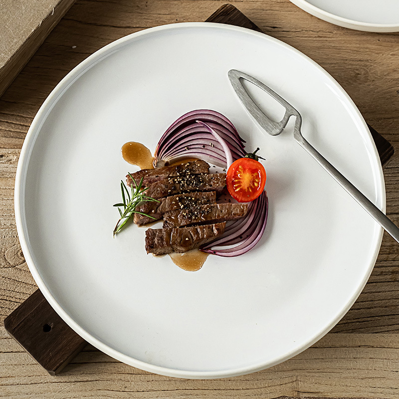 Plato de cerámica de disco minimalista nórdico Plato de verduras para el hogar Plato de postre redondo Plato de filete de restaurante Plato de vajilla al por mayor