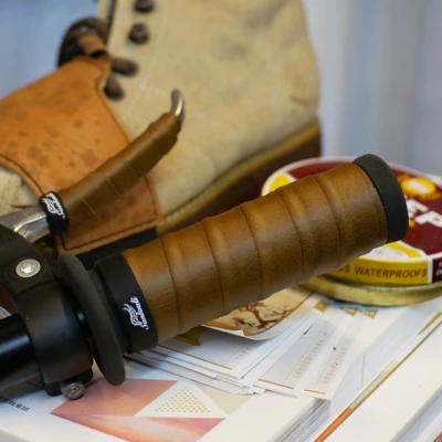 Leather Handlebar Cover Handmade Limited: Motorcycle Handle Cover - brown-british-oil-wax-with-a-pair-of-bones