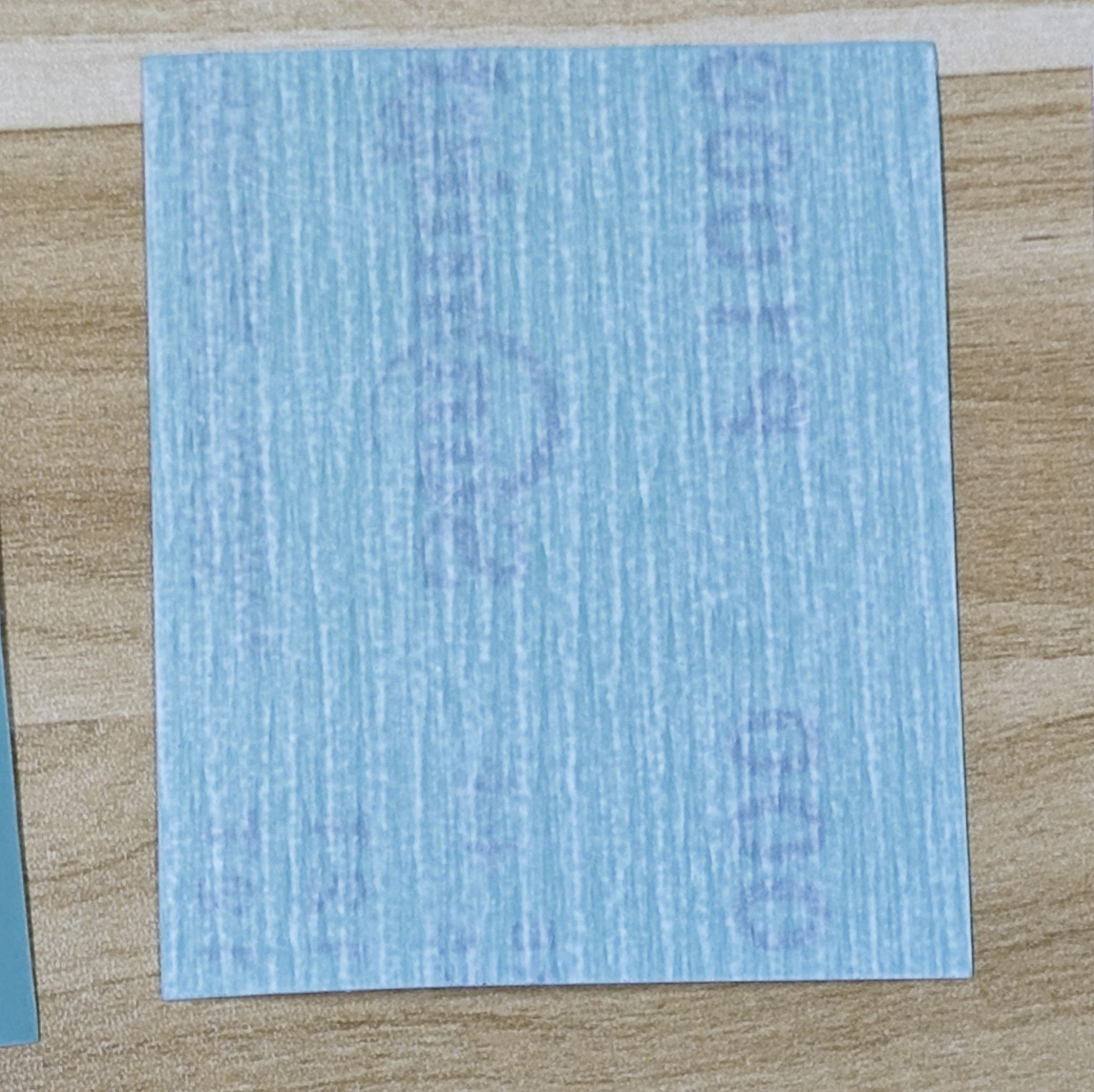 Модельная наждачная бумага 1000 ячеек 75*95 мм (в комплекте с клейкой подложкой)