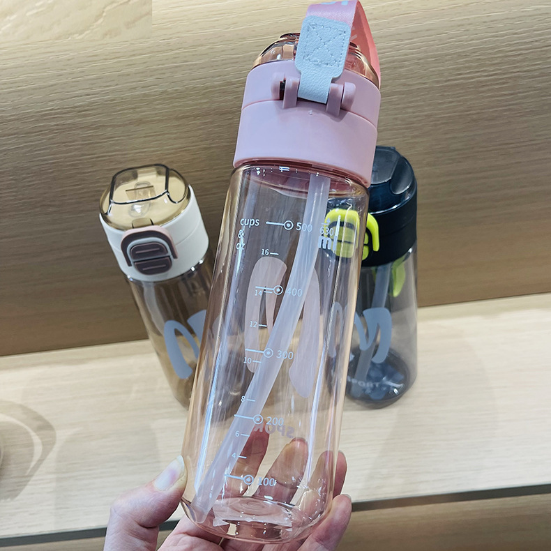 Nueva taza de agua de gran capacidad simple taza de mano coreana doble taza de agua potable portátil taza de plástico deportivo