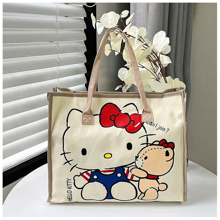 Venta al por mayor de fábrica bolsa de felpa juguete bolsa de mensajero Kulomi peluche de oso de fresa bolso japonés Sanrio