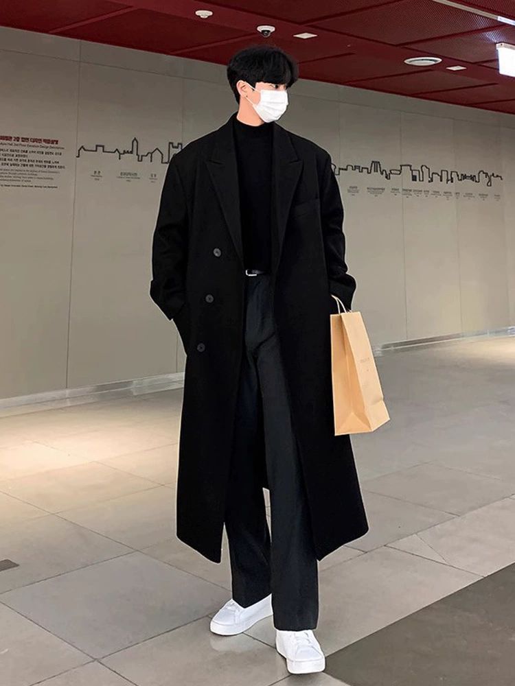 冬の新型の毛はコートの男性の中で長いタイプはひざを過ぎてカシミヤのラシャの風衣の男性のコートの韓国版がゆったりとしています。