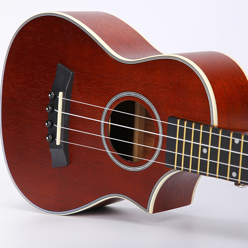 Ukulele 23 pulgadas caoba pequeño ángulo faltante de cuatro cuerdas ukelele guitarra pequeña guitarra eléctrica cabeza instrumento musical al por mayor