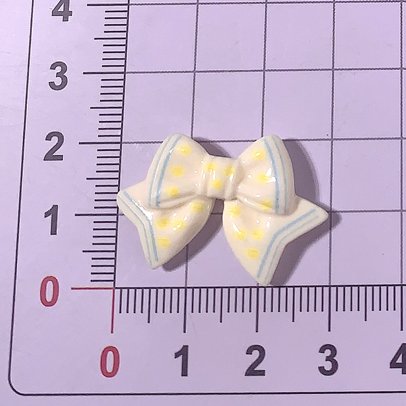 Cartoon brillante color con puntos arco corbata clip de cabello cuerda clip de cabello pegamento de crema DIY accesorios de resina de hebilla