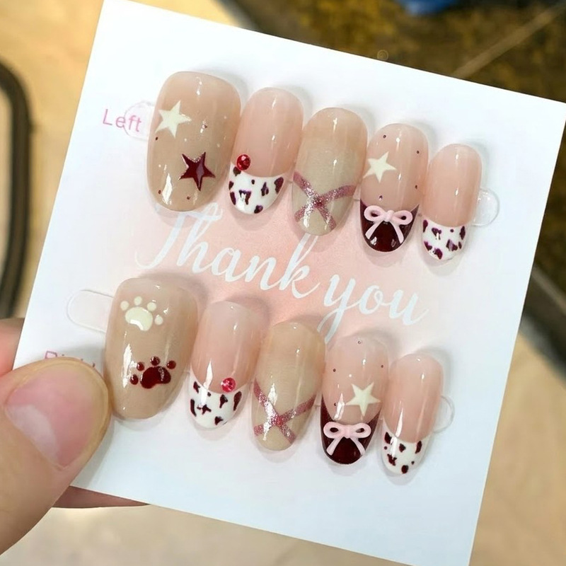 European and American cross-border oval autumn and winter hot girl wear-on nails, two-tone pentagram with hand-applied rhinestones and bow nail stickers wholesale European and American cross-border oval autumn and winter hot girl wear-on nails, two-tone pentagram with hand-applied rhinestones and bow nail stickers wholesale