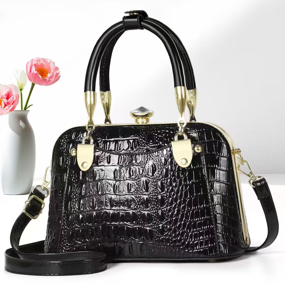 Bolsos de mujer verano nuevo estilo bolso de madre bolso de hombro de mediana edad bolso de mensajero de nicho de regalo de todo fósforo