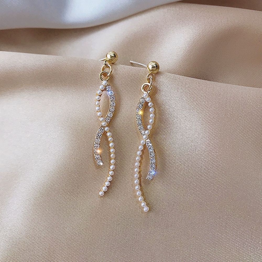 Pendientes largos con flecos elegantes y diamantes con aguja de plata Pendientes de todo fósforo de temperamento de nicho Pendientes simples y ligeros de lujo de alta gama Mujeres