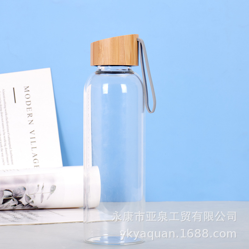 Suministro directo de fábrica Taza de vidrio con tapa de bambú transparente Taza de agua de vidrio de té de oficina de gran capacidad Taza de plástico transparente al por mayor