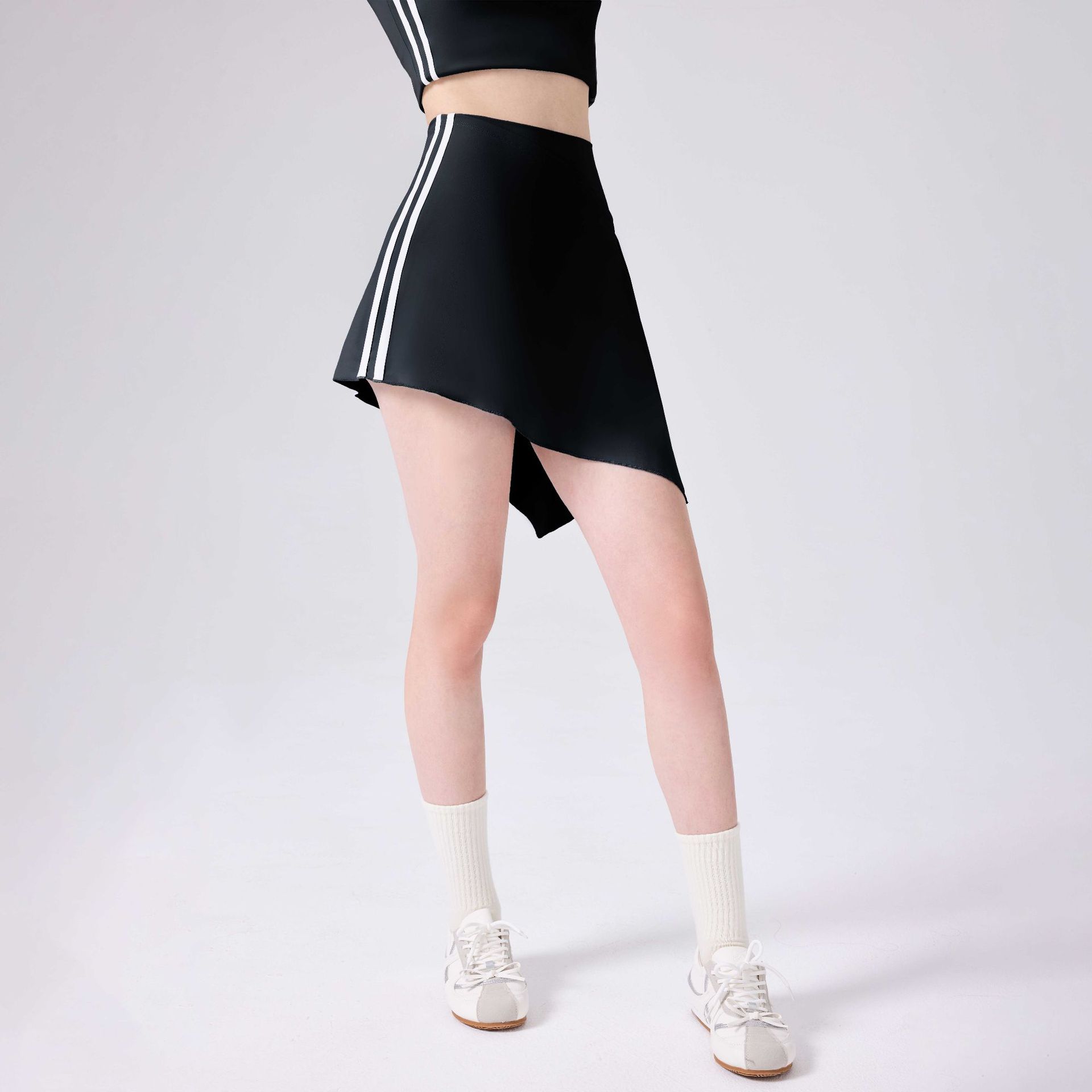 Pantalones calientes deportivos de dos piezas de entrenamiento físico para correr falda corta de cintura alta de verano piel transpirable impermeable al revestimiento