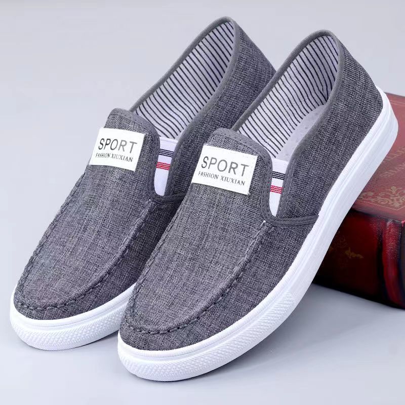Los fabricantes envían una pieza de zapatos de lona de estilo caliente de primavera y verano, zapatos de hombre, zapatos de tela viejos de Beijing, zapatos de trabajo antideslizantes y resistentes al desgaste