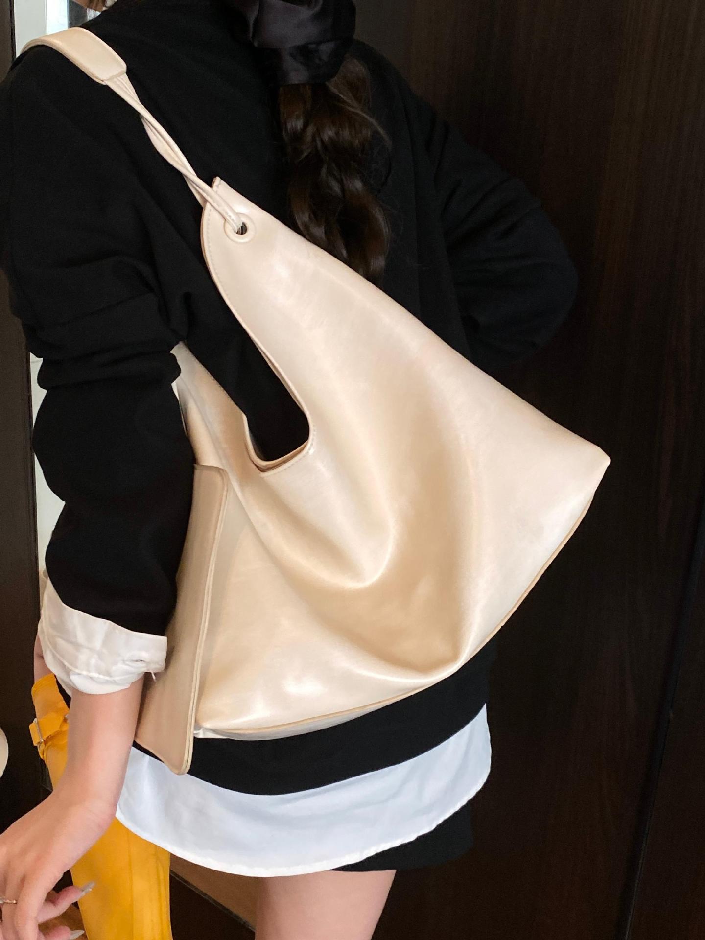 Nuevos productos transfronterizos más vendidos Bolso de cuero suave para axilas para mujer 2025 Modelo súper caliente Bolso de hombro de gran capacidad de viento perezoso