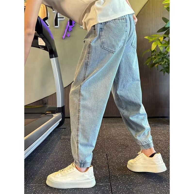 Jean de jogging à taille élastique pour homme, coupe ample et tendance, style harem, idéal pour le printemps et l'automne. Pantalon fuselé polyvalent et décontracté._voghion.com