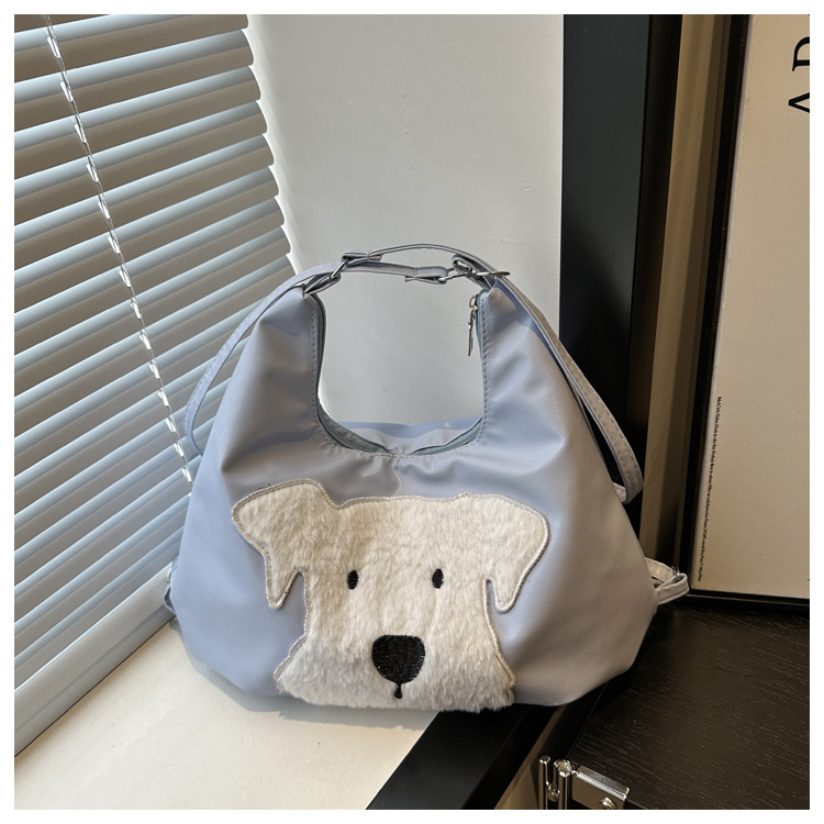 The new autumn and winter 2024 fashion cartoon backpack with simple, individual and niche design, single-shoulder bag and commuter tote bag undefined