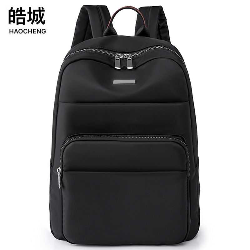 2023 nueva mochila de nailon casual para mujer, simple viaje de negocios, mochila para computadora de gran capacidad, mochila escolar al por mayor