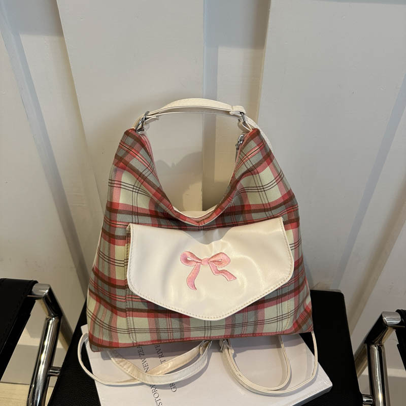 Bolsa coreana con rayas de contraste para mujeres 2024 verano nueva moda universitaria arco bolso de hombro sensación de alto nivel