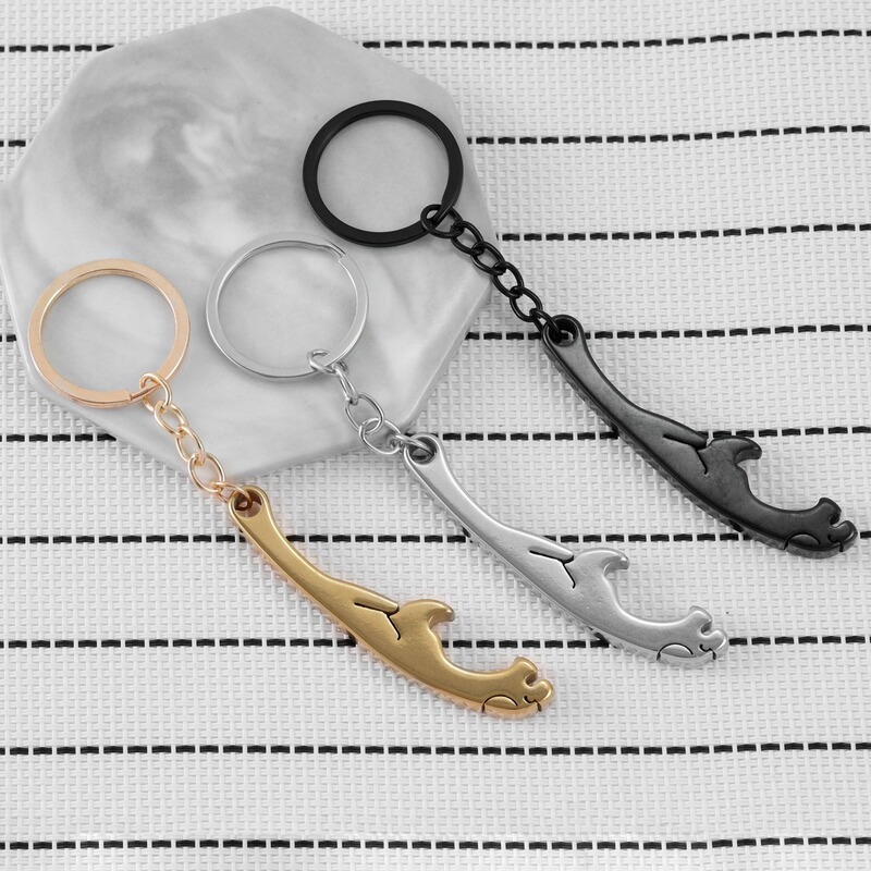 High-Quality Stainless Steel Bottle Opener Keychain with a Simple Leopard Design, Suitable as a Travel Backpack Accessory High-Quality Stainless Steel Bottle Opener Keychain with a Simple Leopard Design, Suitable as a Travel Backpack Accessory