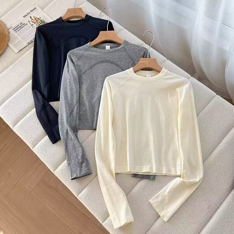 Highly Elastic, Comfortable, Breathable, Seamless Round Neck Finger Cots, Long Sleeves, Slimming Look, Quick-Drying Yoga Tops, T-Shirts for Women, Sports Style Highly Elastic, Comfortable, Breathable, Seamless Round Neck Finger Cots, Long Sleeves, Slimming Look, Quick-Drying Yoga Tops, T-Shirts for Women, Sports Style