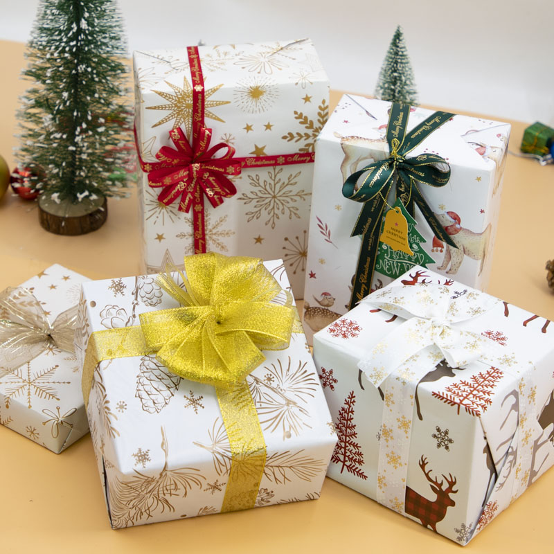 Nuevos productos creativos 10 hojas al por mayor día de Navidad día de Año Nuevo regalo caja de regalo papel de embalaje de papel de Navidad de color artesanal