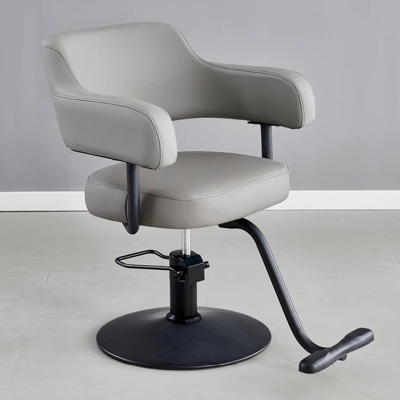 Barbería transfronteriza, silla de corte de pelo