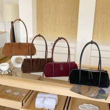 小众设计复古翻毛波士顿包2025新款极简百搭单肩腋下包腊肠枕头包