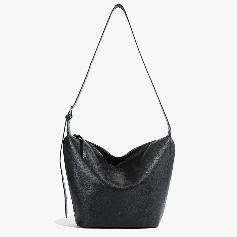 Bolsas de textura retro de estilo universal para mujeres de gran capacidad 2025 nuevo estilo universal bolsas de cubo de hombro nicho bolsas de bolsas de饺os de viaje