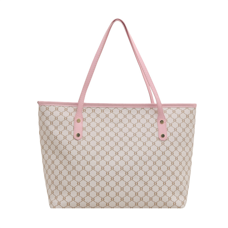 Bolsos sencillos y de moda de gran capacidad para mujer 2025 primavera nuevo bolso de moda bolso de hombro portátil de gran capacidad para viajeros