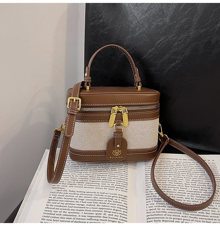 Bolso de mano de alta sensación para mujeres 2025, nueva moda transfronteriza, bolso de caja de empalme de color, bolso casual, bolso cuadrado simple