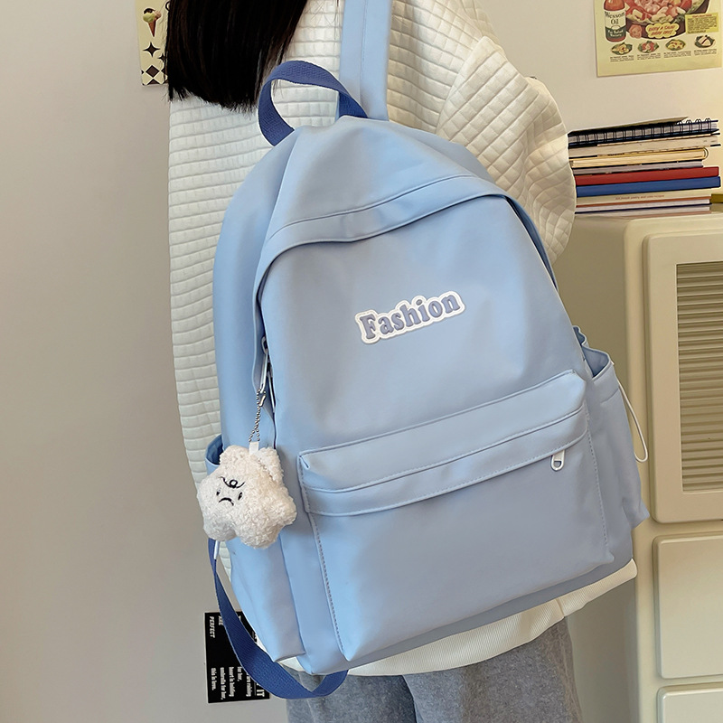 简约纯色休闲双肩包初中生大学生书包ins高颜值原宿情侣校园背包