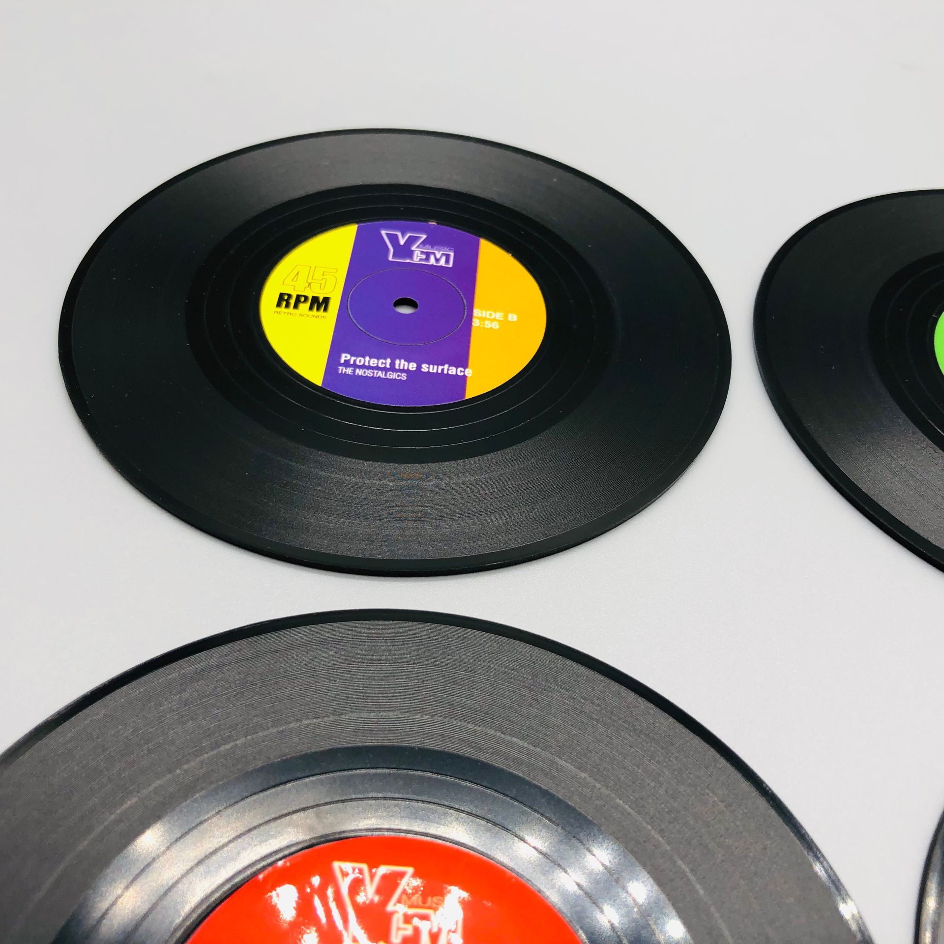 Venta caliente retro CD Coaster disco de vinilo cerveza bar estera de café de plástico taza de té estera productos transfronterizos ventas directas de la fábrica