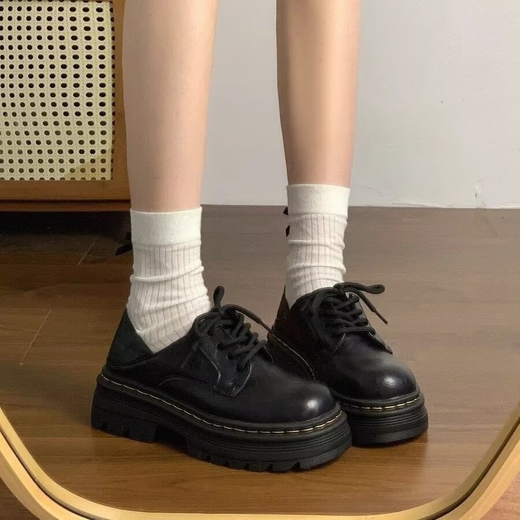Redonda cabeza dos zapatos de cuero retrógrados para mujeres verano y otoño 2026 nuevo estilo británico con suela gruesa para ir con falda Martin zapatos individuales